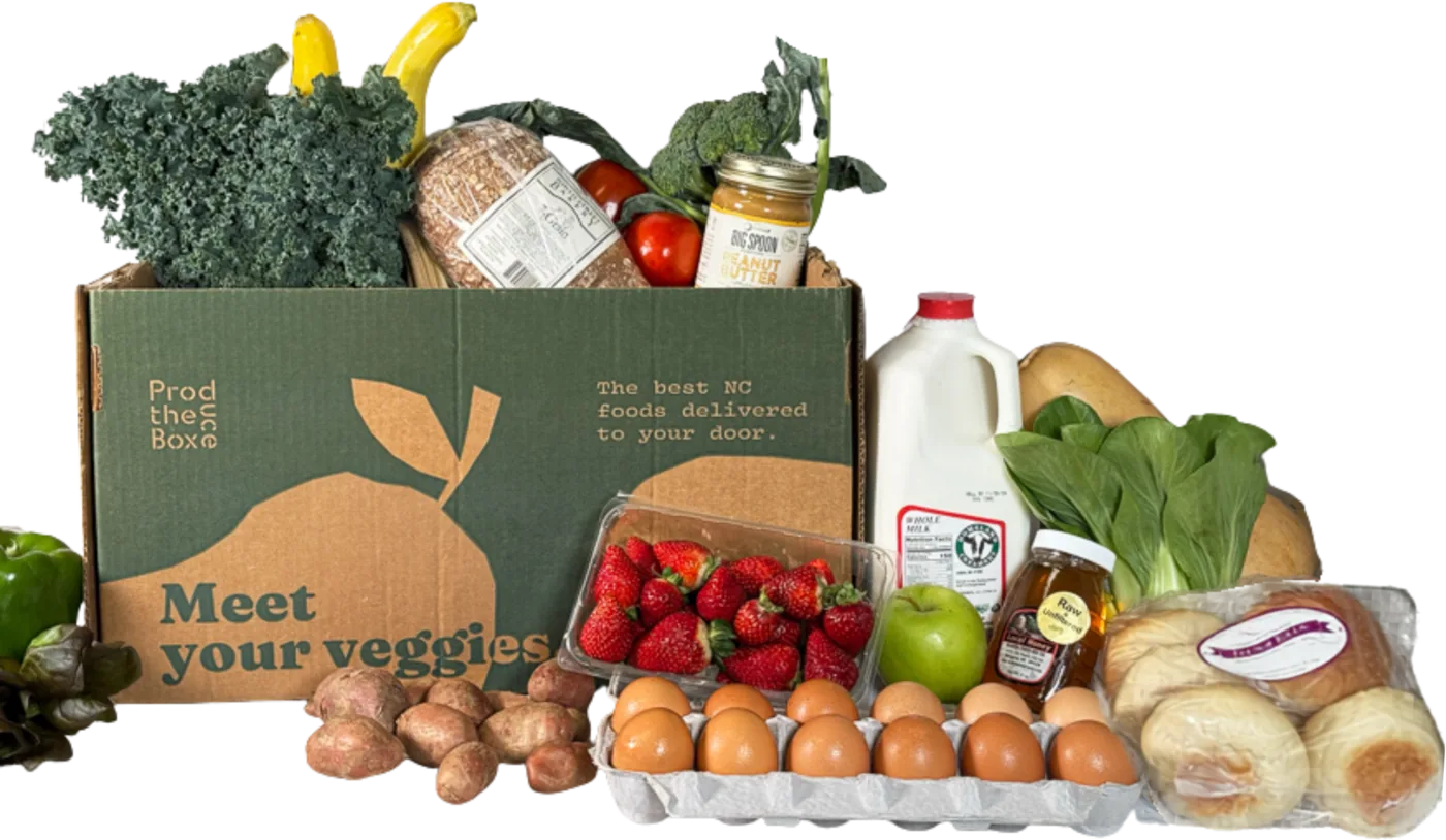 A Produce Box delivery: a box of local produce with bread, milk, eggs and preserves